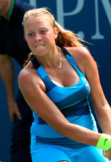 a woman in a blue tank top