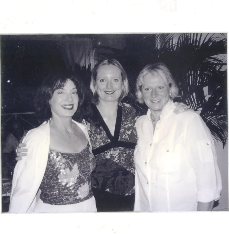 a group of women posing for a photo