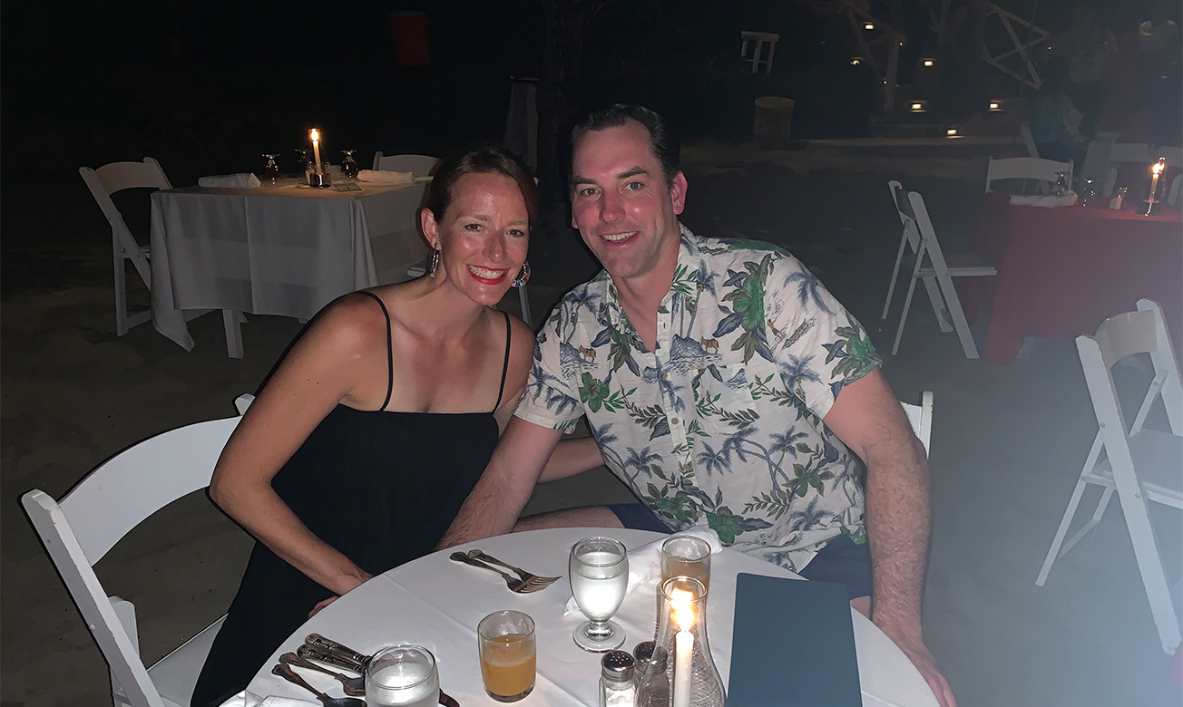 a man and woman sitting at a table