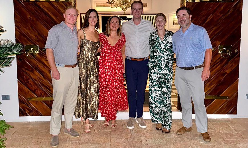 a group of people posing for a photo