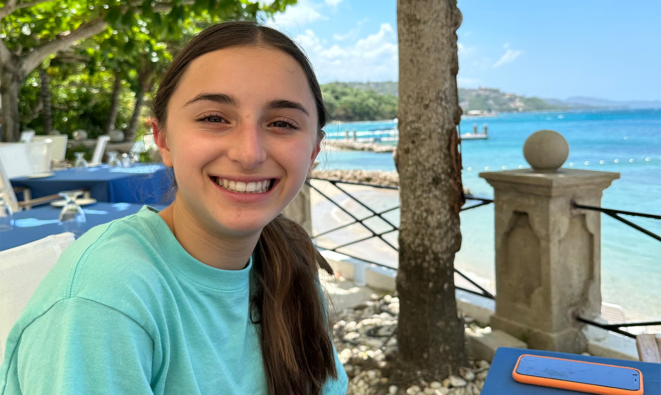 a woman smiling at camera