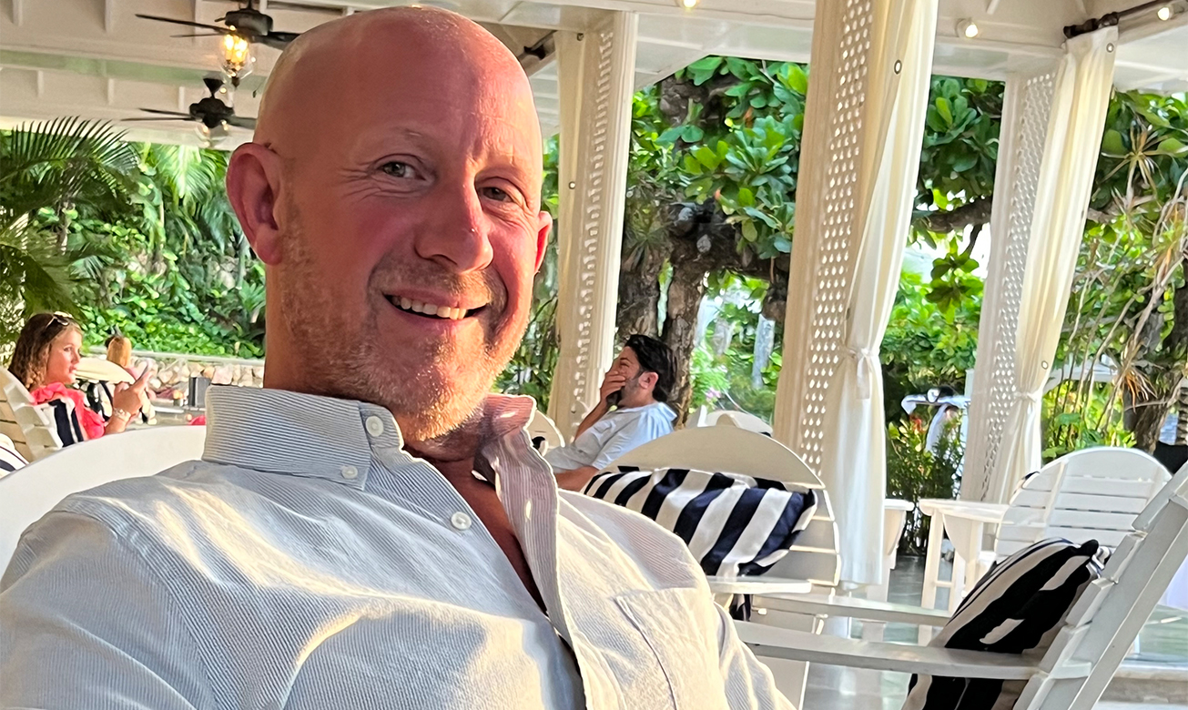 a man smiling at camera