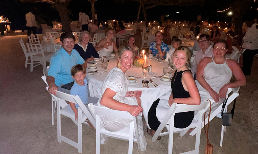 a group of people sitting at a table
