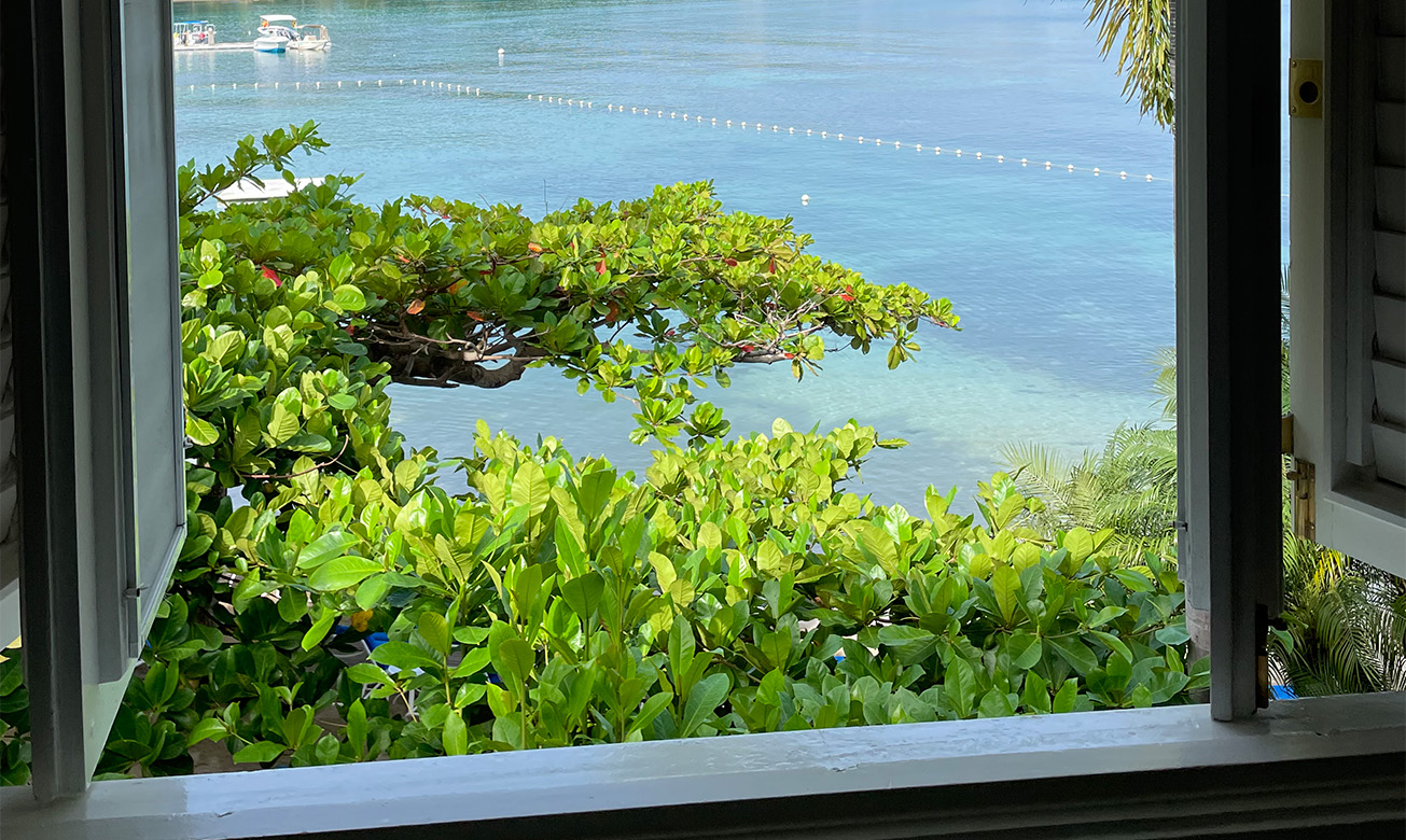 a view of a body of water from a window