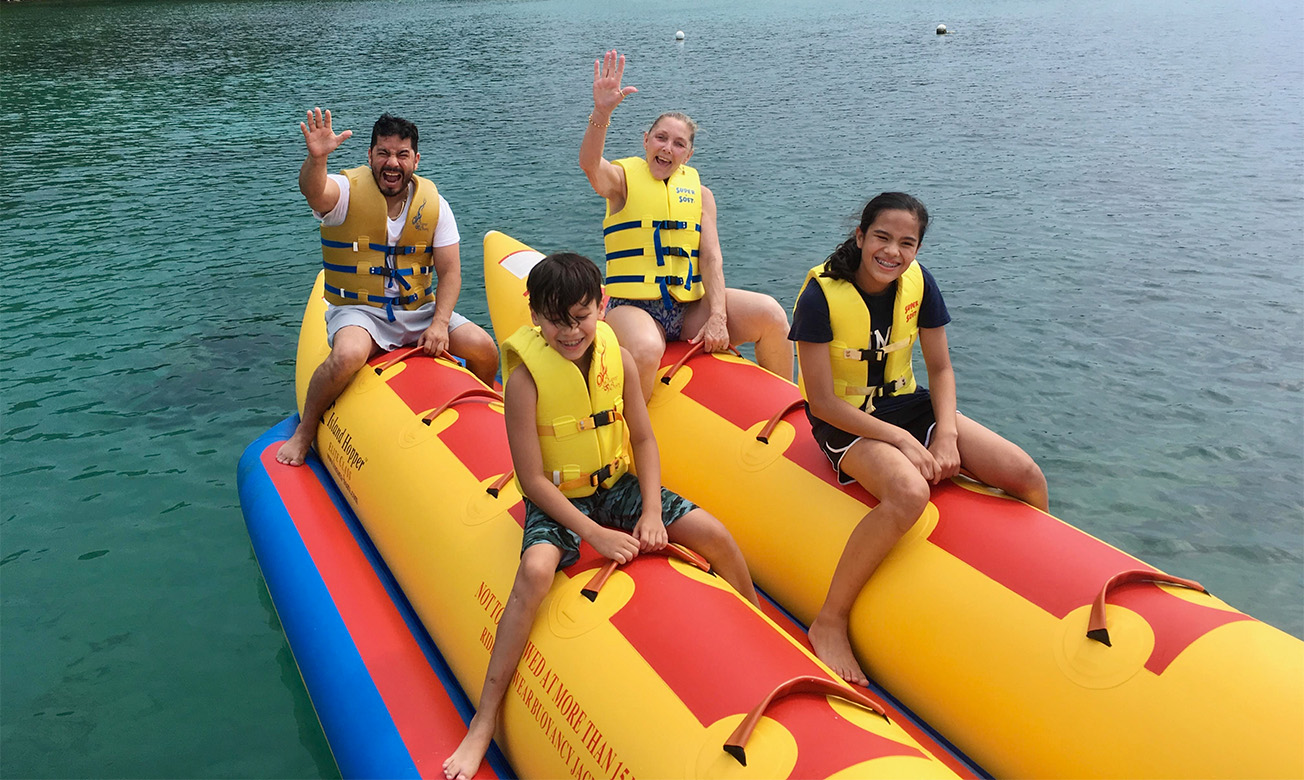 a group of people on a raft