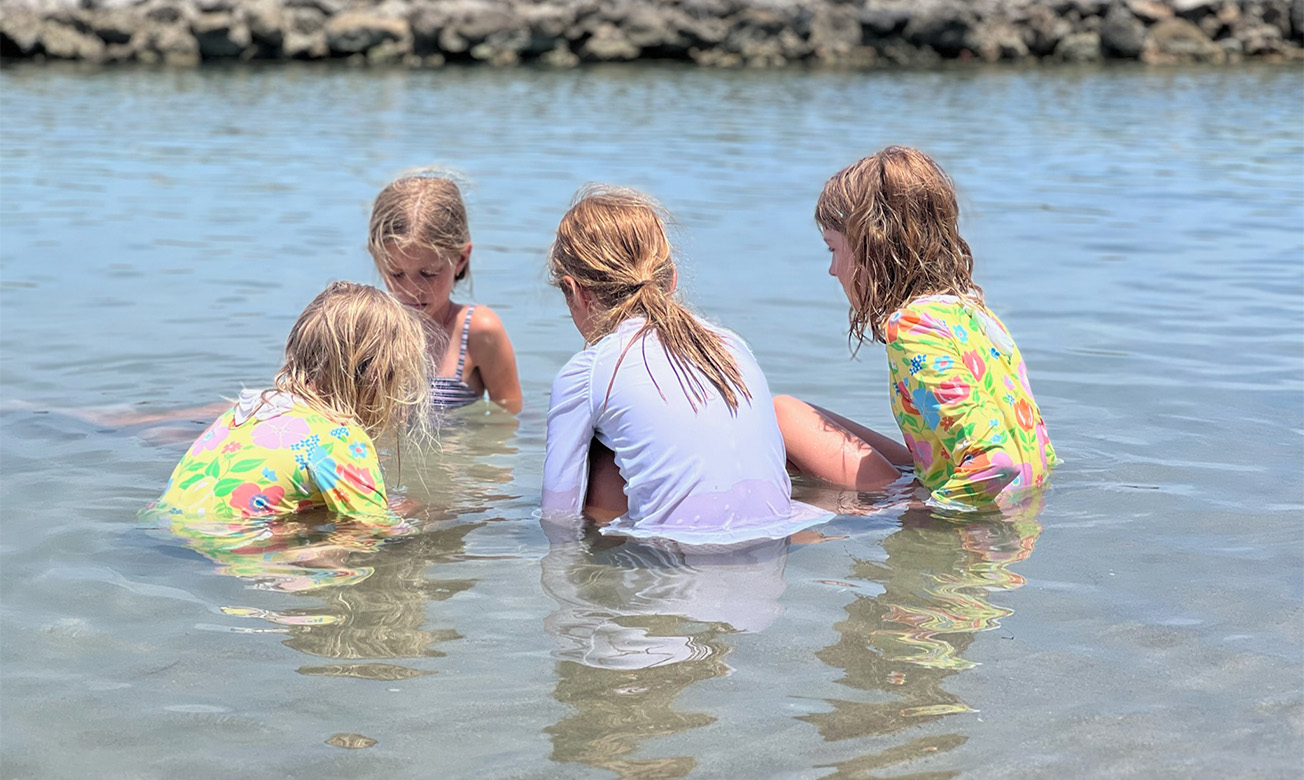 a group of girls in water