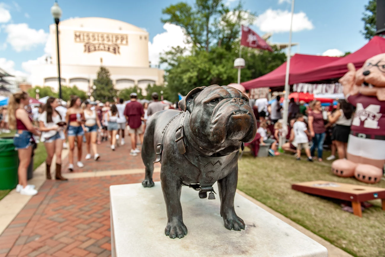 a statue of a dog on a pedestal