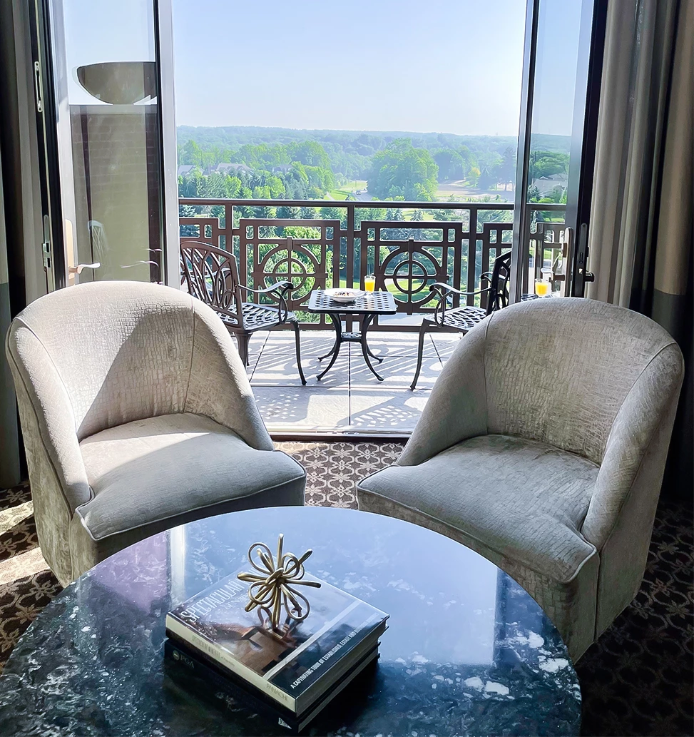 a room with chairs and a table
