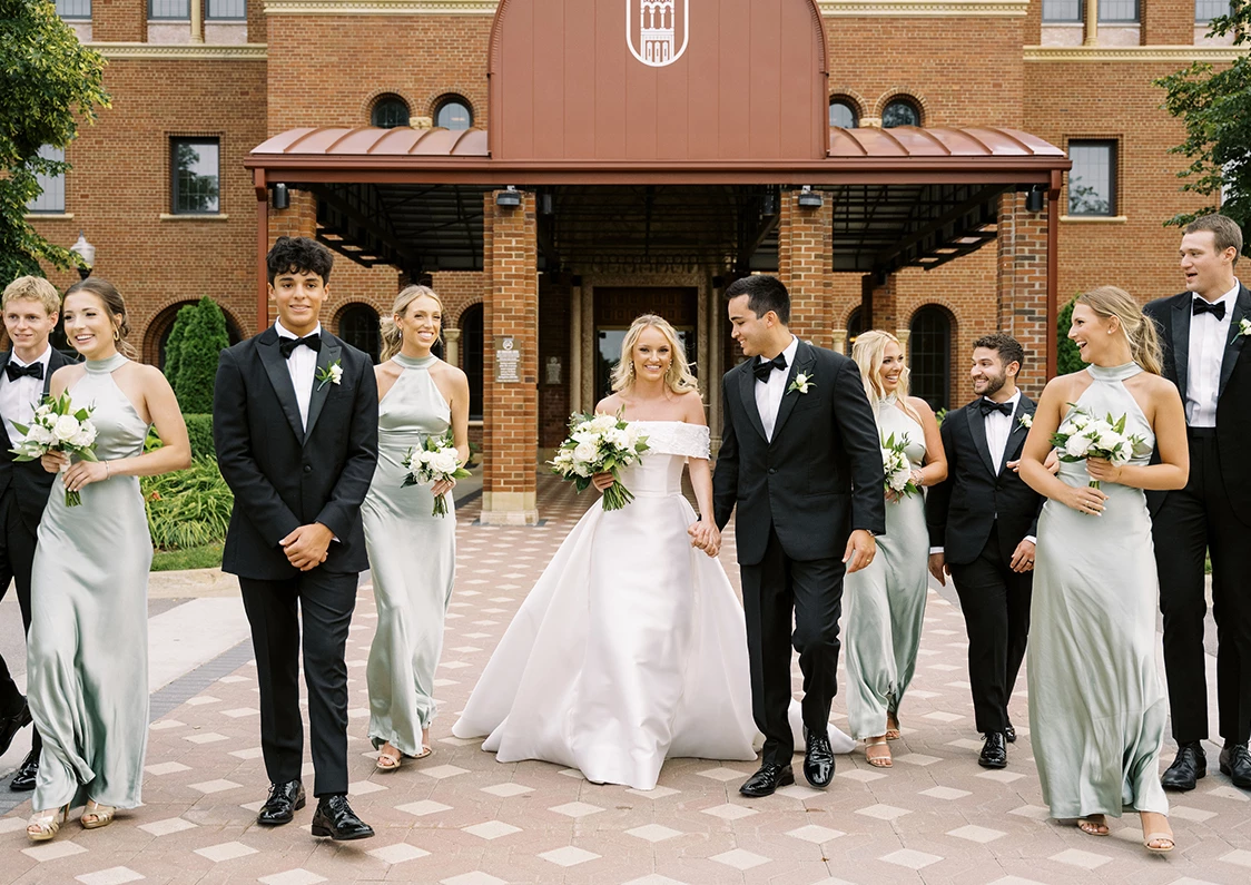 a group of people walking outside a building