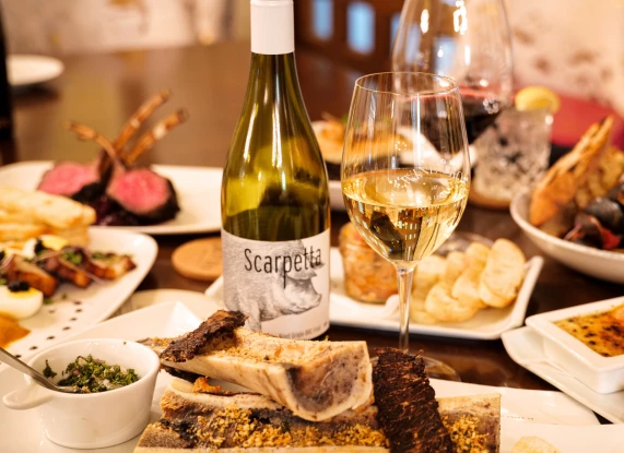 a table with food and wine