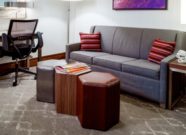 a couch and a chair in a room