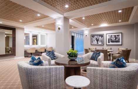 a room with chairs and tables