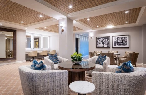 a room with chairs and tables