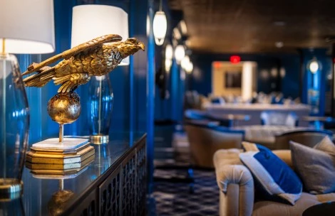 a gold eagle statue on a table