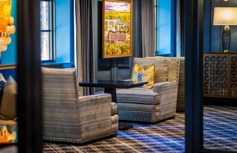 a room with chairs and a table