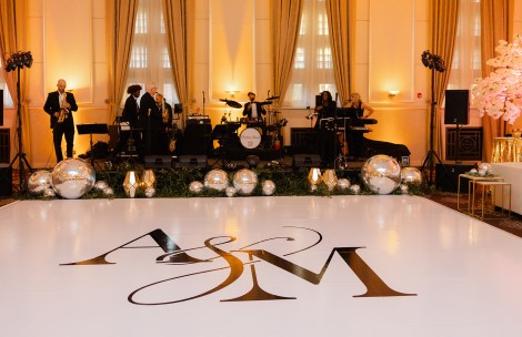 a group of people playing instruments in a room