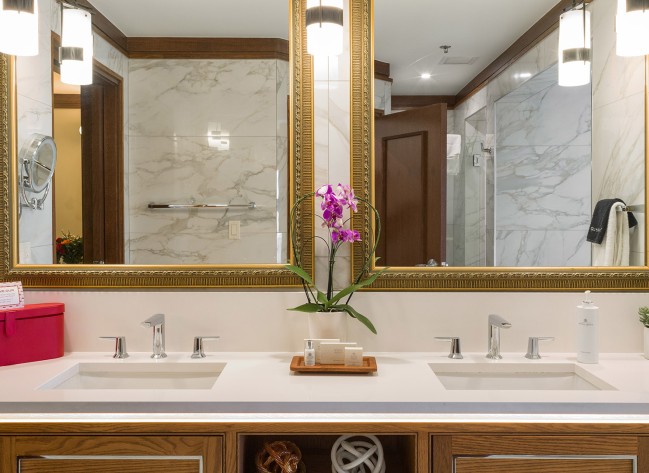 a bathroom with a mirror and sink