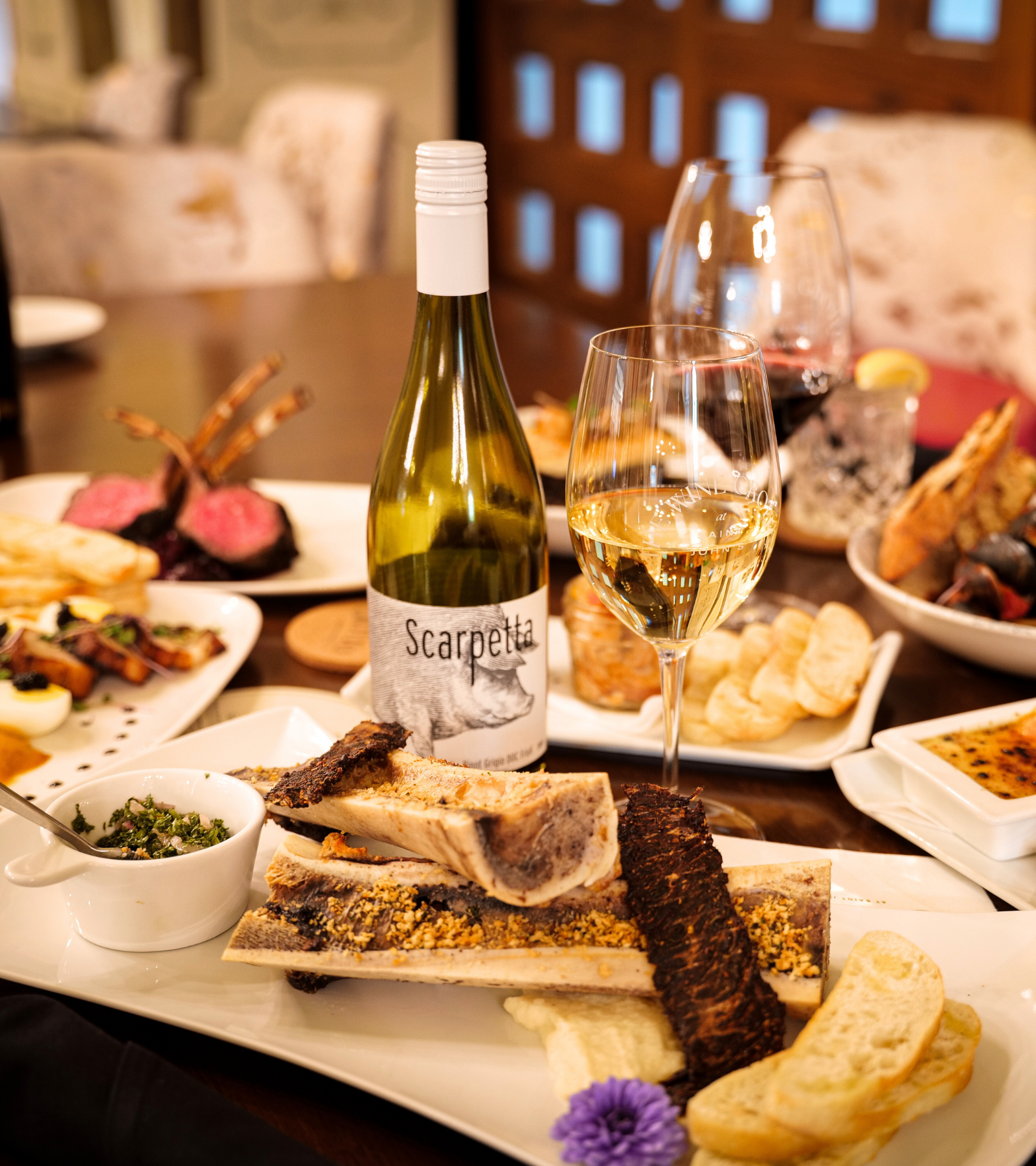 a table with food and wine