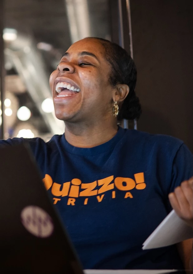 a woman laughing 