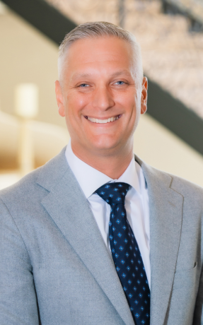 a man in a suit and tie