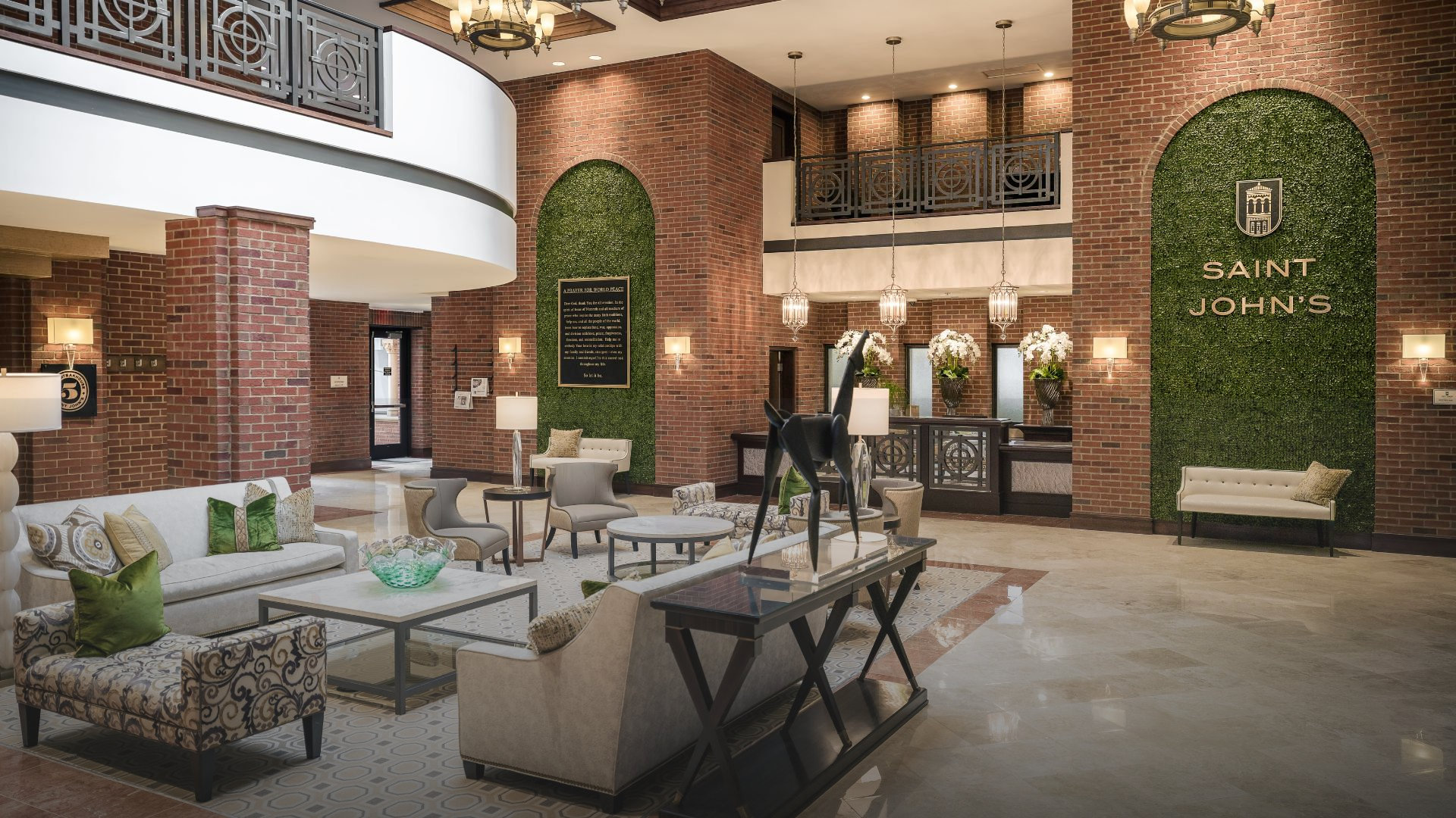 a room with brick walls and a large table and chairs
