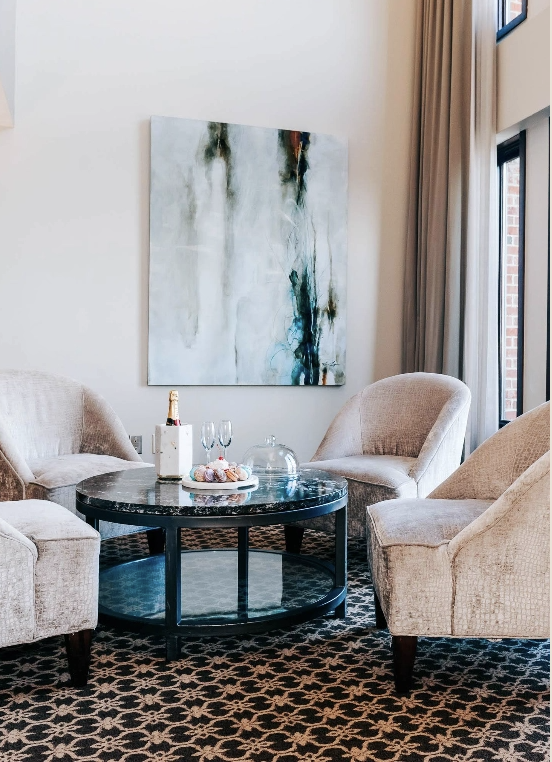 a room with chairs and a table