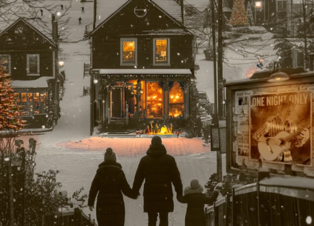 a group of people walking down a snowy street