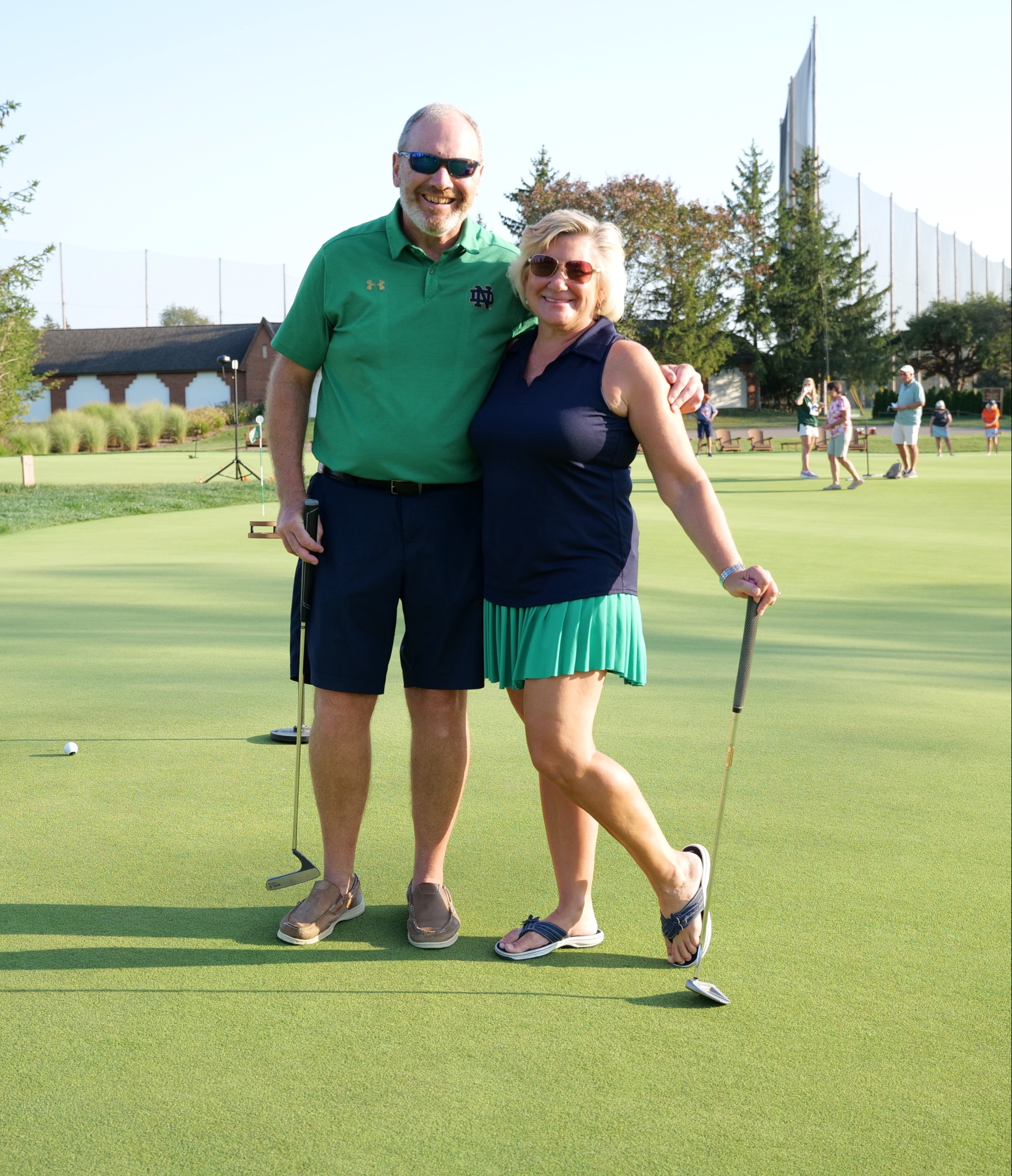 a man and woman posing for a picture
