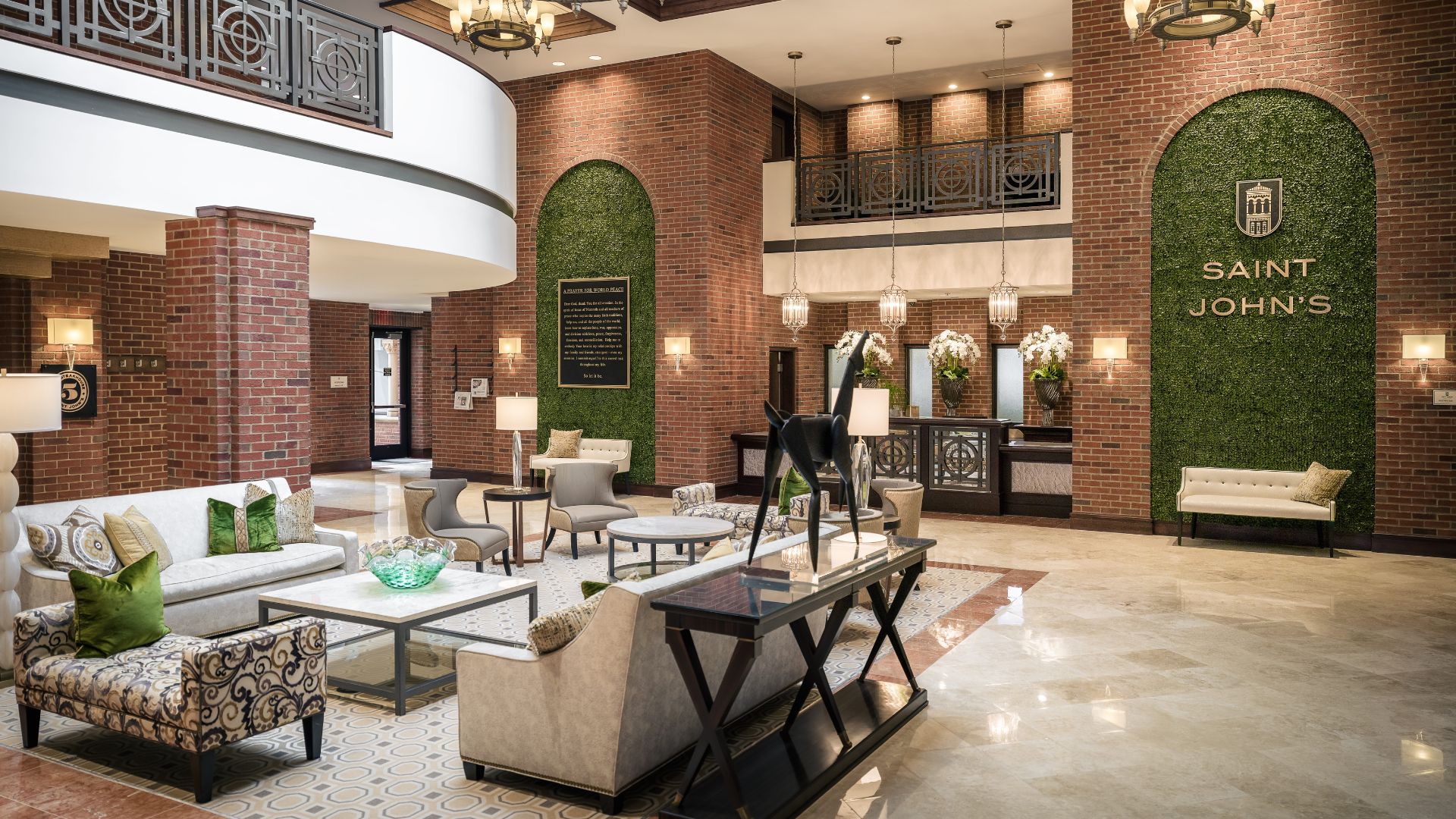 a room with brick walls and a large table and chairs