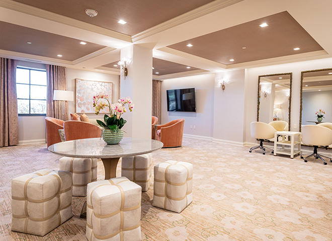 a room with a table and chairs