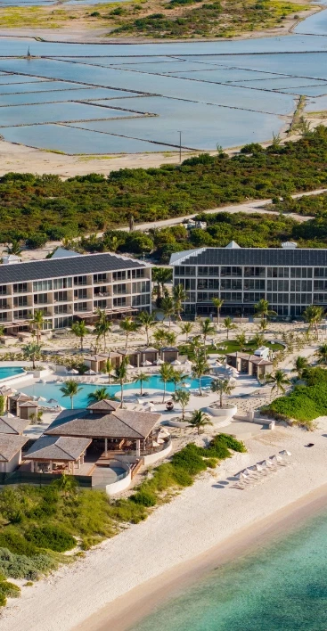 a resort with a pool and trees