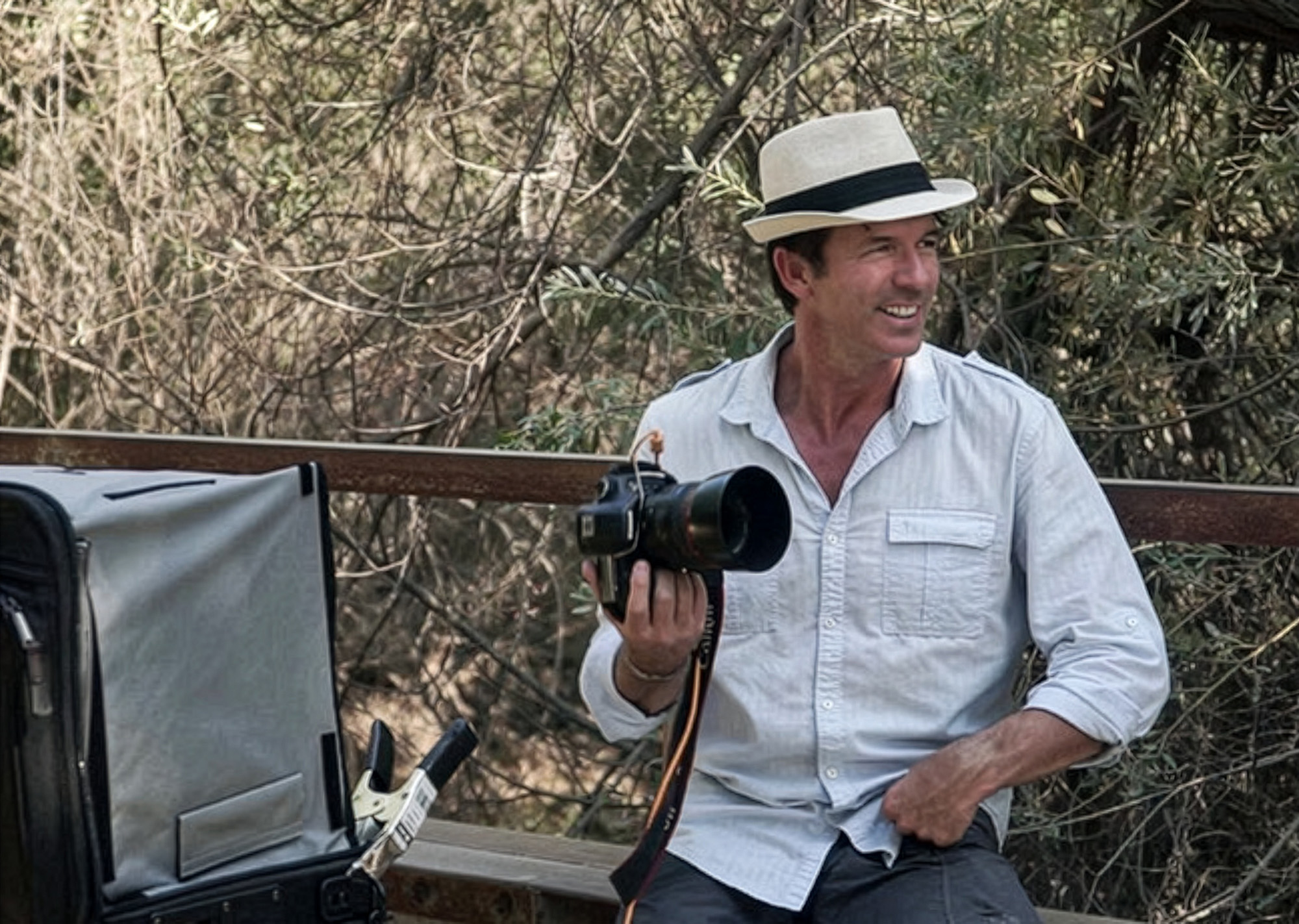 a man holding a camera
