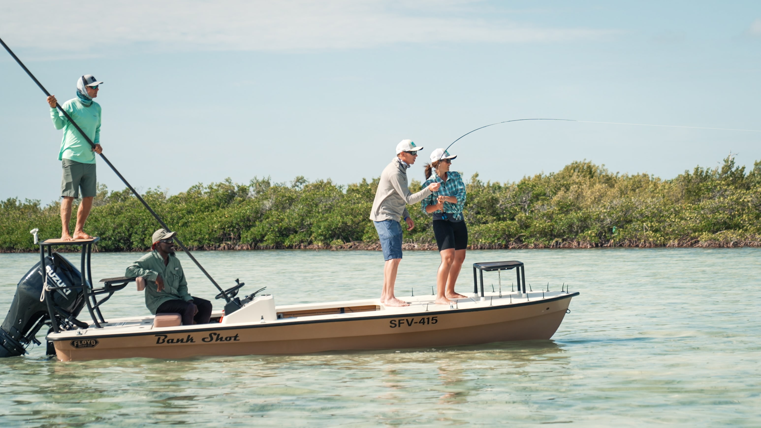 a group of people on a boat fishing