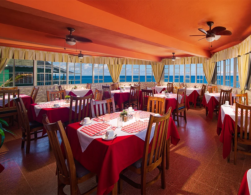 a room with tables and chairs