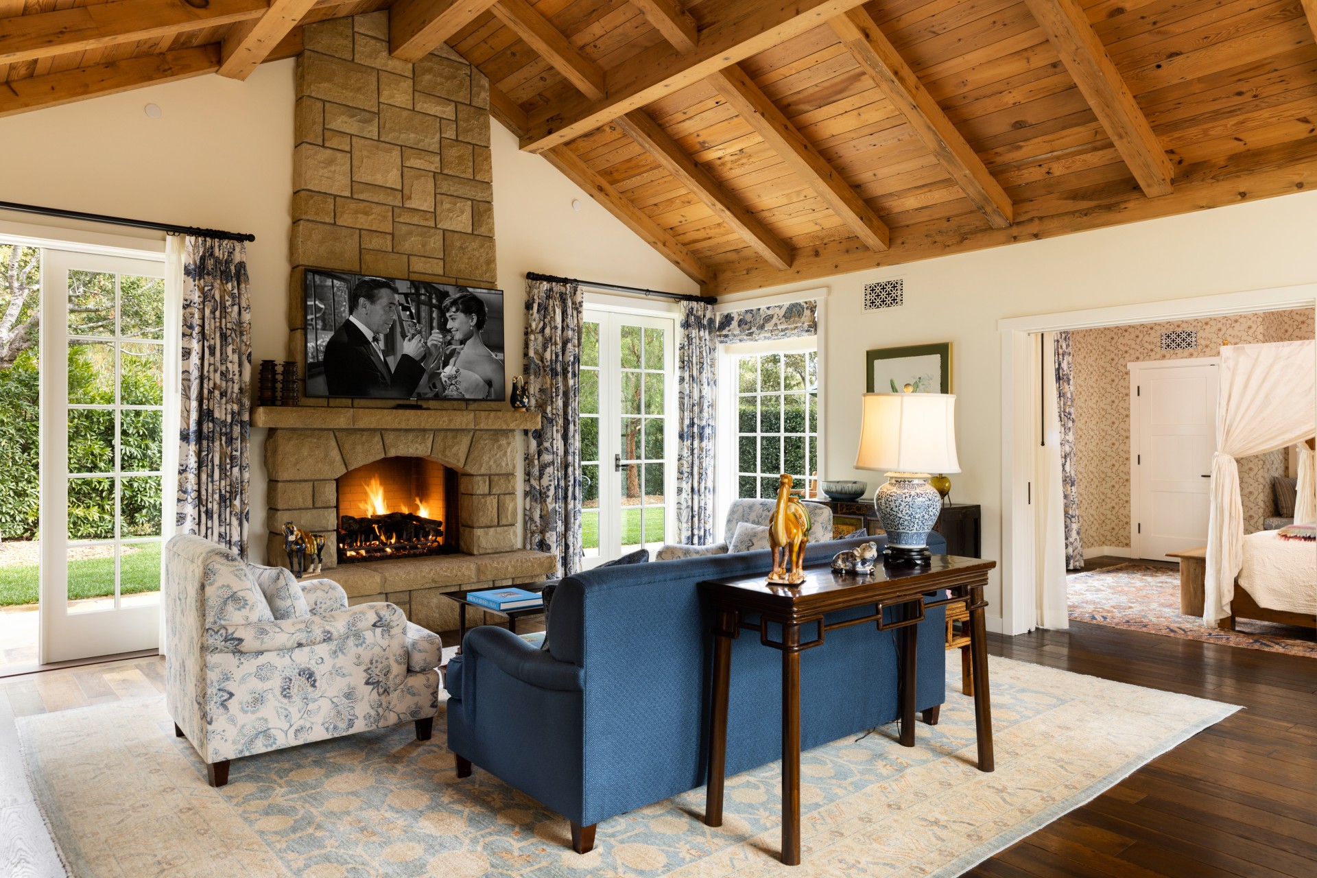 a living room with a fireplace and a couch