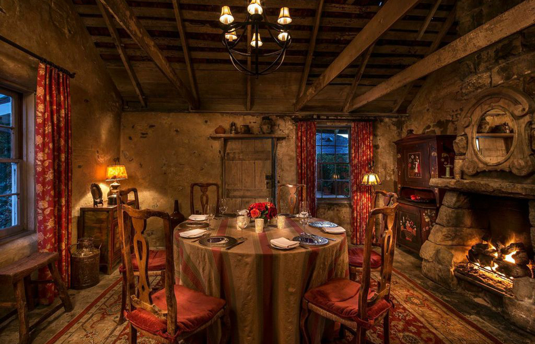 a dining room with a fireplace