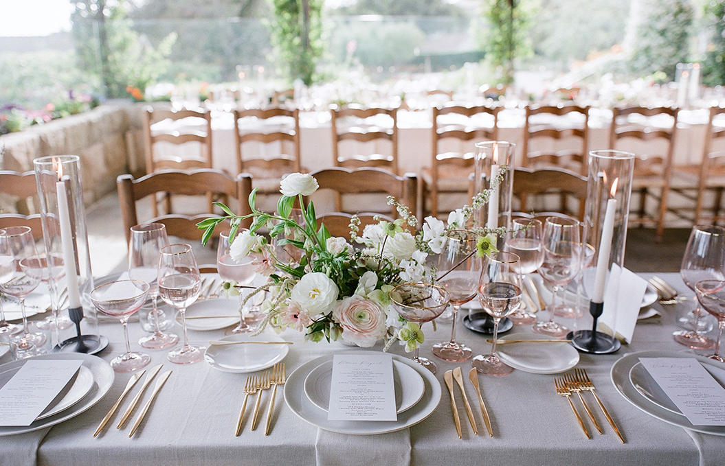 a set dining table with white flowers