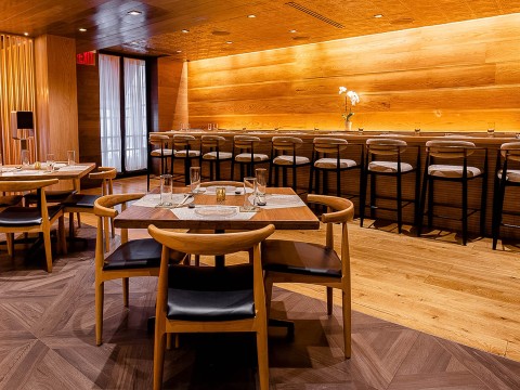 a room with tables and chairs