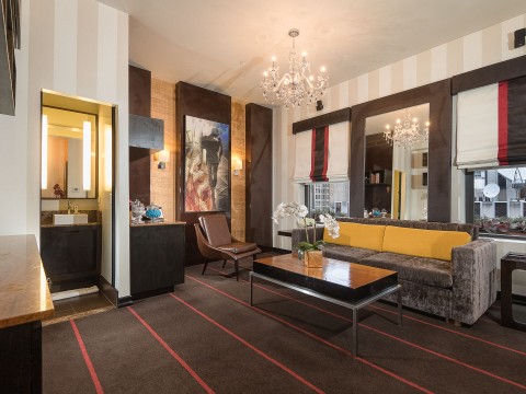 a room with a couch and a coffee table