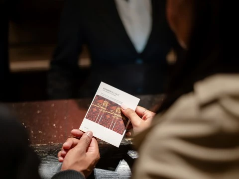 a person holding a card