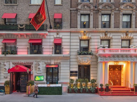 a building with a flag on the front