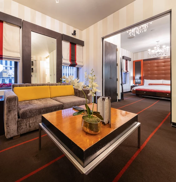 a room with a couch and a sofa