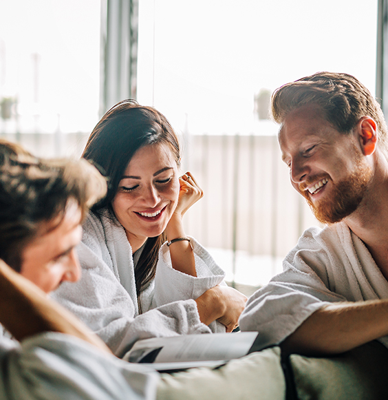 a group of people in bathrobes