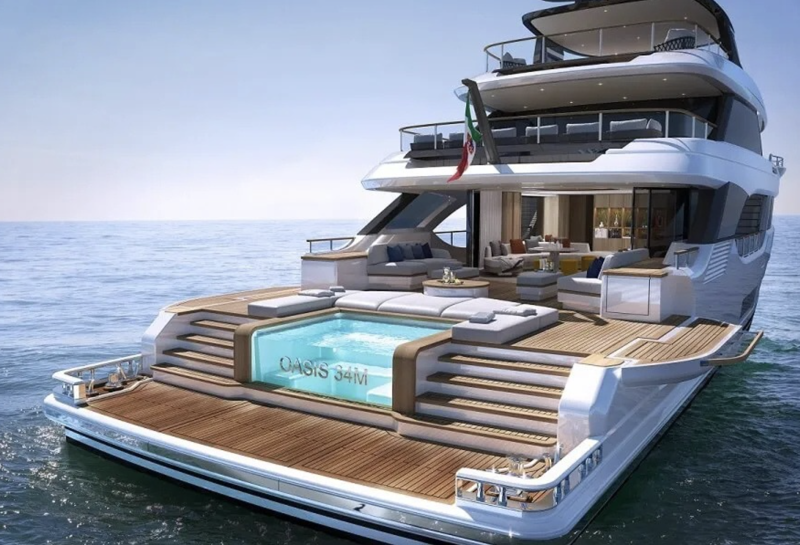 a large white and black yacht with a pool in the middle of it