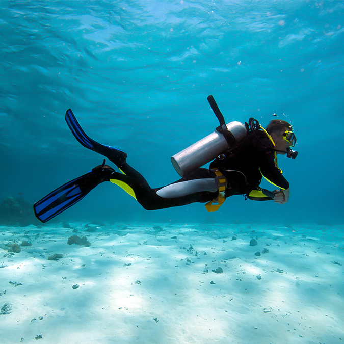 a person in a scuba suit underwater