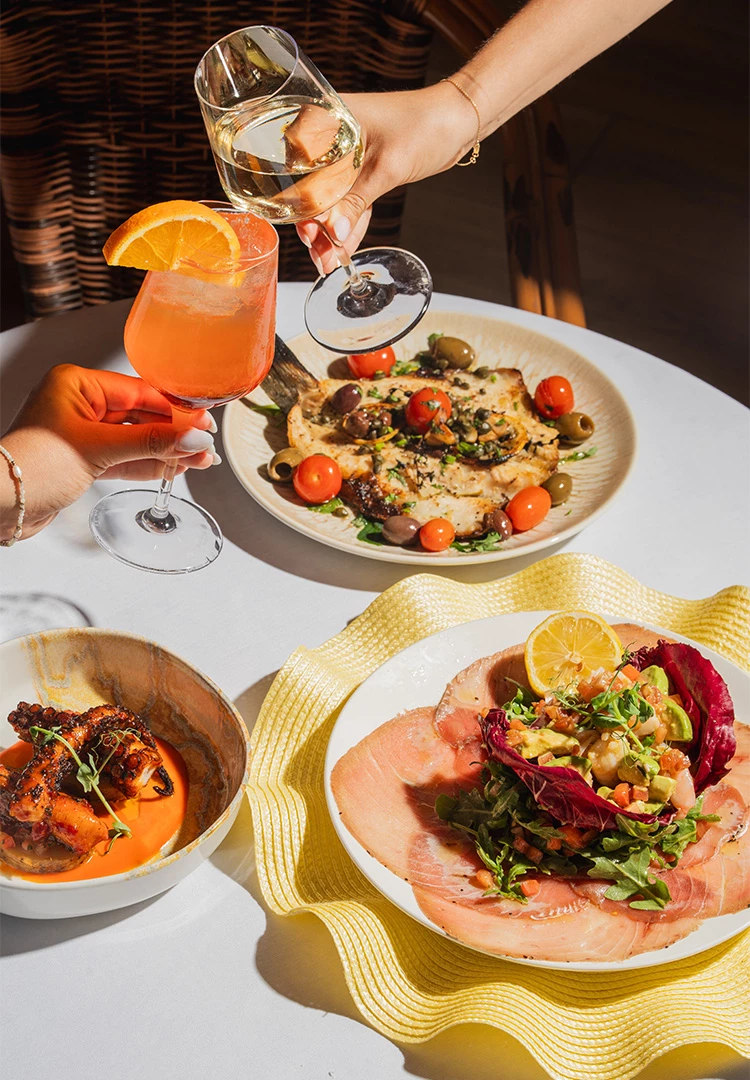 a table set with food and drinks