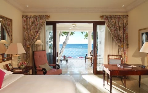 a bedroom with a large glass door