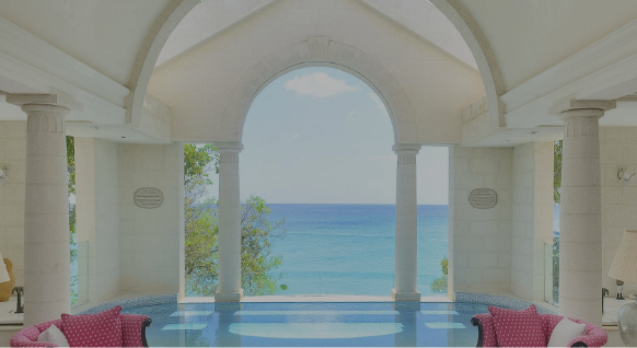 a pool with a view of the ocean