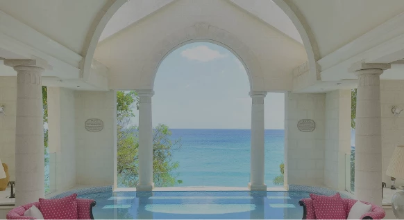 a pool with a view of the ocean