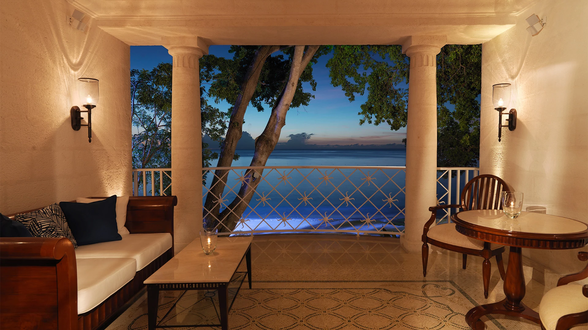 a room with a pool and chairs